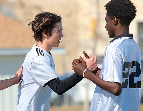 Vincent Massey Viking Calen Sass, left, celebrates his first of two goals against the Crocus Plainsmen with teammate Timi Fadare during their 4-1 win in Brandon High School Soccer League action on Wednesday. (Thomas Friesen/The Brandon Sun)