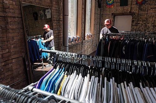 MIKE DEAL / FREE PRESS 
Selections at the Clothing Bakery are sorted first by style, then by colour.