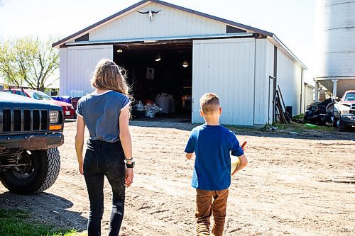 MIKAELA MACKENZIE / FREE PRESS

Alexa (left, 11) and Micah (eight) Bouw walk out to feed a bottle-fed calf on Edie Creek Angus ranch near Anola on Wednesday, May 8, 2024. 


