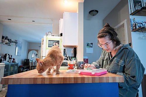 Ruth Bonneville / Free Press

49.8 - Creators - pet portraits

Journalist portraits of local artist,  Annick Svistovski, working from home on painting portraits of pets from a photo her clients have provided for her.  Her house cats love to hang around while she works.  

Name of cat in this photo: Hawkins 

Story: 49.8 The Creators: Pet Portrait Artist

Annick is a painter who specializes in painting animal portraits from pictures which her clients send her. She&#x573; currently painted cats and dogs only but is hoping to be able to paint other pets.

 
Story by AV Kitching 


May 9th, 2024
