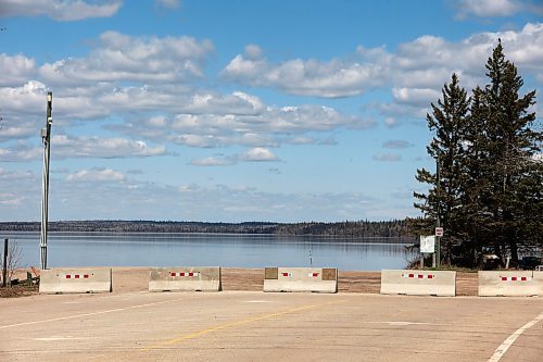 09052024
Concrete barriers block vehicle and boat access to the Wasagaming boat launch at Clear Lake in Riding Mountain National Park on Thursday. A decision about whether boats and other water craft will be allowed onto Clear Lake this year is expected ahead of the upcoming May long weekend. (Tim Smith/The Brandon Sun)