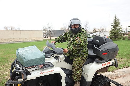 09052024
Captain Sam Agustin, Chaplain 2PPCLI with his Can-Am Outlander ATV at CFB Shilo. Agustin drives the ATV year-round and is well known on base because of his unique ride. (Tim Smith/The Brandon Sun)