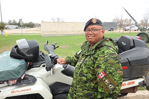 09052024
Captain Sam Agustin, Chaplain 2PPCLI with his Can-Am Outlander ATV at CFB Shilo. Agustin drives the ATV year-round and is well known on base because of his unique ride. (Tim Smith/The Brandon Sun)