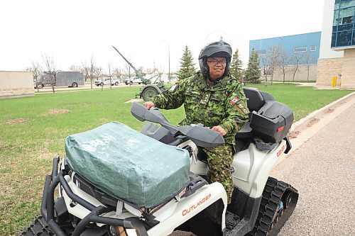 09052024
Captain Sam Agustin, Chaplain 2PPCLI with his Can-Am Outlander ATV at CFB Shilo. Agustin drives the ATV year-round and is well known on base because of his unique ride. (Tim Smith/The Brandon Sun)