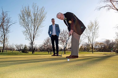 BROOK JONES / FREE PRESS
Gavin Speirs, 79, watches his putt as his son Adam Speirs, 45, calls the line of play while the duo have fun together and test their golf skills on the putting green prior to being inducted into the Manitoba Golf Hall of Fame at the Breeszy Bend Country Club in Headingley, Man., Thursday, May 9, 2024. Adam was honoured for the class of 2023 and Gavin was honoured for the class of 2023.