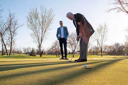 BROOK JONES / FREE PRESS
Gavin Speirs, 79, watches his putt as his son Adam Speirs, 45, calls the line of play while the duo have fun together and test their golf skills on the putting green prior to being inducted into the Manitoba Golf Hall of Fame at the Breeszy Bend Country Club in Headingley, Man., Thursday, May 9, 2024. Gavin was honoured for the class of 2022 and Adam was honoured for the class of 2023.