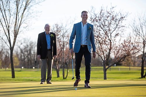 BROOK JONES / FREE PRESS
Adam Speirs, 45, right, and his dad Gavin Speirs, 79, are pictured having fun on the practice green prior to being inducted into the Manitoba Golf Hall of Fame at the Breeszy Bend Country Club in Headingley, Man., Thursday, May 9, 2024. Adam was honoured for the class of 2023 and Gavin was honoured for the class of 2022.