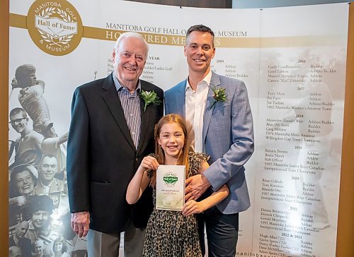 BROOK JONES / FREE PRESS
Adam Speirs, 45, (right) is pictured with his 10-year-old daughter Harper Speirs, (middle) and his father Gavin Speirs, 79, (left) at the 20th annual Manitoba Golf Hall of Fame induction ceremony at the Breeszy Bend Country Club in Headingley, Man., Thursday, May 9, 2024. Adam was honoured for the class of 2023 and Gavin was honoured for the class of 2022.