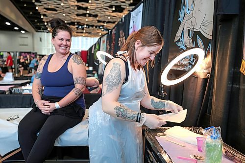 Ruth Bonneville / Free Press

local standup - wpg tatto show

Tattoo artist, Candace Reid (apron), works with her client, Jasmine Currie, on selecting and prepping her for a tattoo at her booth at the 5th annual Tattoo Show at the RBC Convention Centre Friday. 

The weekend will include tattoo competitions, The WINNIPEG BEAUTY Fantasy Hair and Make up Competition, as well as over 40 vendors for jewellery, apparel, artwork, piercing, clothing, and more. 

May 10th, 2024

