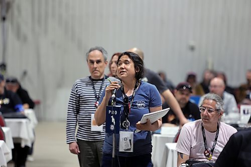 A delegate at the Manitoba Federation of Labour conference in Brandon speaks on a motion calling for the MFL and the Manitoba Nurses Union to team up to lobby the provincial government to regulate private nursing agencies on Friday. (Colin Slark/The Brandon Sun)