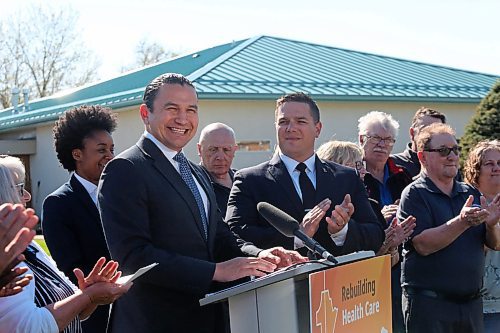 Manitoba Premier Wab Kinew grins at the sound of loud community applause after announcing the reopening of the emergency room at the Carberry Health Centre on Friday morning. See story on Page A2. (Matt Goerzen/The Brandon Sun)