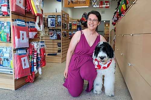 Ruth Bonneville / Free Press

BIZ - Flag Shop

Photo of Samantha Hobson with heir store mascot, a 6-month old, Portuguese Water Dog named Griffin,  sporting a Canada Flag bandana. 

Story: The Flag Shop, is holding a grand-re-opening event on Sat May 11 at its new location on south Osborne. The store opened on Pembina Hwy in 1996 as  a family-run venture: 

There are various pics filed for the new store including: exterior shot (Mathew putting out benches), shots of the various merchandise - country flags, group photo, store mascot - 6-month old Griffin sporting a Canada Flag bandana and Magda (mom) hard @ work - she's the entire sewing department.

Dave Sanderson 

May 10th, 2024

