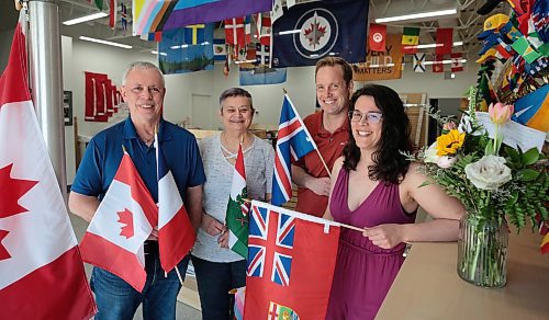 Ruth Bonneville / Free Press

BIZ - Flag Shop

Group photo of Samantha and her husband Mathew Hobson,  alongside her parents Guy &amp; Magda Gauthier. 

Story: The Flag Shop, is holding a grand-re-opening event on Sat May 11 at its new location on south Osborne. The store opened on Pembina Hwy in 1996 as  a family-run venture: 

There are various pics filed for the new store including: exterior shot (Mathew putting out benches), shots of the various merchandise - country flags, group photo, store mascot - 6-month old Griffin sporting a Canada Flag bandana and Magda (mom) hard @ work - she's the entire sewing department.

Dave Sanderson 

May 10th, 2024
