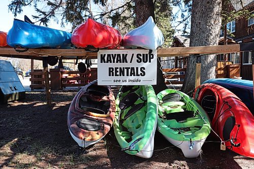 09052024
Kayaks and stand-up paddle boards offered for rent at Cycle Creek Outdoor Supply in Wasagaming. Parks Canada announced on Thursday that all personal watercraft, including motorized boats, canoes, kayaks and paddle boards, will be banned from use on Clear Lake for the 2024 season as part of work to determine whether invasive zebra mussels have established a presence in the lake.   (Tim Smith/The Brandon Sun)