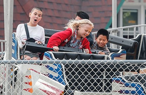 JOHN WOODS / FREE PRESS
Harmony, left, and her friend Kendra enjoy a ride at Tinkertown just east of Winnipeg Sunday, May 12, 2024. Tinkertown opened earlier tan expected due to nice weather.

Reporter: tyler