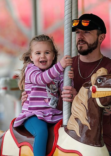 JOHN WOODS / FREE PRESS
Joey and daughter Annie ride the carousel at Tinkertown just east of Winnipeg Sunday, May 12, 2024. Tinkertown opened earlier tan expected due to nice weather.

Reporter: tyler