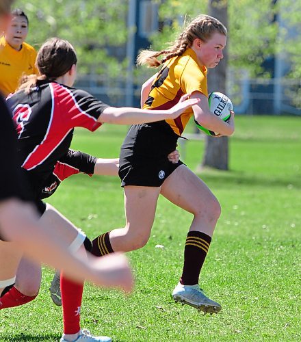 Crocus Plainsmen senior inside center Ocean Komishin-Glass breaks free to score one of her two tries during her team's 52-0 win over Swan Valley during Westman High School Rugby (WHSR) league action. (Jules Xavier/The Brandon Sun)