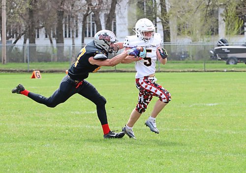 Team West's Orin McKay of Shoal Lake (87 black) reaches out to try to bring down Team East's Ryder Clayton of Souris (5 white) near the goal-line during the Rural Manitoba Football League all-star game at Neelin on Saturday afternoon. Team West earned a 32-14 victory. It took McKay a few yards but he was able to tackle the running back. (Perry Bergson/The Brandon Sun)
May 11, 2024