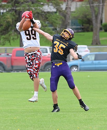 Team West's Preston Talbot of Virden (35 black) gets his hand on the ball at the last second to knock it away from Team East's Odin Thorarinson of the St. Vital Mustangs (99 white) near the goal-line during the Rural Manitoba Football League all-star game at Neelin on Saturday afternoon. Team West earned a 32-14 victory. (Perry Bergson/The Brandon Sun)
May 11, 2024
