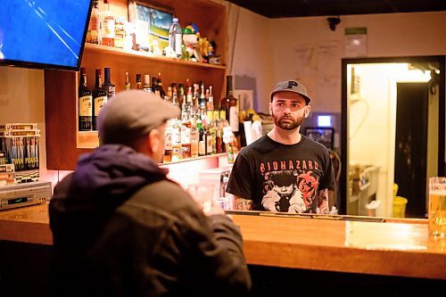 Mike Sudoma/Free Press
Co owner Jesse Kowalski chats music with a patron prior to the Manitoba Metalfest After Party event Sunday evening
May 12, 2024