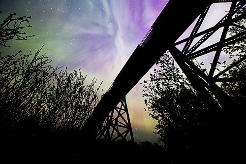 A stopped freight train atop the railway trestle at Rivers, MB is silhouetted against dancing aurora borealis in the night sky late Saturday. A severe geomagnetic storm &#x2014;&#xa0;the strongest the earth has seen in 20 years &#x2014;&#xa0;caused northern lights to be seen across the northern hemisphere this past weekend, as a result of several solar flares exploding off the Sun. (Matt Goerzen/The Brandon Sun)