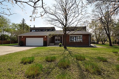 Photos by Todd Lewys / Free Press
Situated in the midst of a mature five acre lot, this mid-century modern marvel offers a rare combination of country living and city convenience.