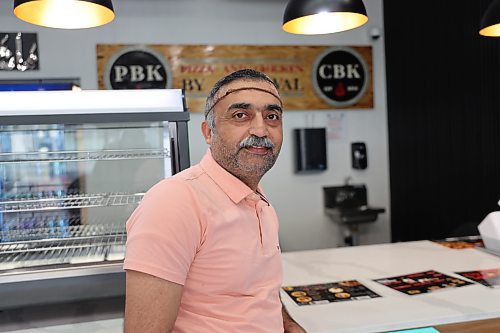 Pizza & Chicken by Kanwal manager Imtiaz Ahmad inside the restaurant at 935 A Rosser Ave. in downtown Brandon on Wednesday. (Abiola Odutola/The Brandon Sun)