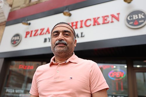 Manager Imtiaz Ahmad stands in front of Pizza & Chicken by Kanwal at 935 A Rosser Ave. downtown Brandon on Wednesday. Ahmad says, unlike traditional pizzerias, "we infuse our ingredients into the pizza dough, resulting in a one-of-a-kind taste sensation." Photos: Abiola Odutola/The Brandon Sun