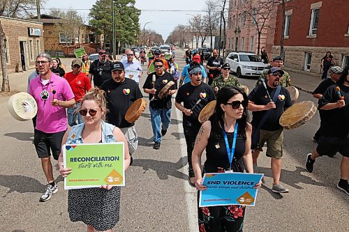 11052023
A few dozen marchers take part in the Moose Hide Campaign Walk to End Violence in Brandon on a hot Thursday. The walk aimed at taking action to end violence against women and children was organized by 
the Brandon Urban Aboriginal People&#x2019;s Council and Assiniboine Community College. It began and ended at Princess Park. The Moose Hide Campaign began in B.C. as an indigenous-led campaign to engage men and boys in ending violence towards women and children. 
(Tim Smith/The Brandon Sun)