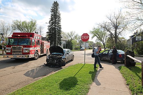 Brandon Police Service and Brandon Fire and Emergency Services attend the scene of a two-vehicle collision at the intersection of 13th Street and Van Horne Avenue early Wednesday evening. (Colin Slark/The Brandon Sun)