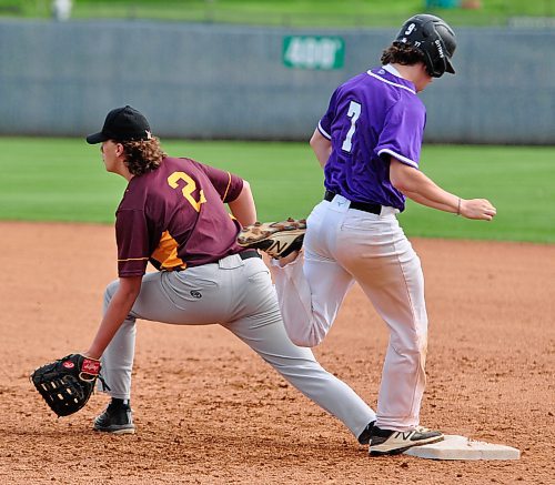 Vincent Massey Vikings centre fielder Carter Dittmer (7) is safe at first base when the ball arrived late to Crocus Plainsmen first baseman Will Galatiuk. (Jules Xavier/The Brandon Sun)