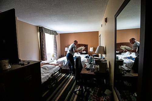 MIKAELA MACKENZIE / FREE PRESS

Des Kappel, displaced resident from Birchwood Terrace, with his dog Nemo in the hotel room they are currently staying in on Wednesday, May 15, 2024. 

For Tyler story.

