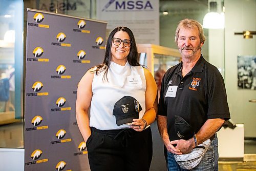 MIKAELA MACKENZIE / FREE PRESS

New Football Hall of Fame inductees Andrea Backlund and Brian Marks at the Sport Manitoba building in on Thursday, May 16, 2024. 

For Josh story.

