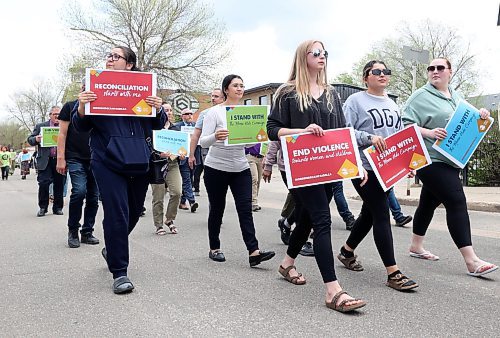 Dozens of participants marched down Princess Avenue on Thursday afternoon to take a stand against violence toward women and children along the road to reconciliation. (Matt Goerzen/The Brandon Sun)