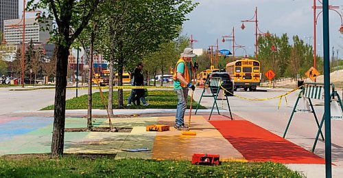 MIKE DEAL / FREE PRESS
James Culleton paints the rainbow flag onto the sidewalk at The Forks, something he has been doing for many years.
James Culleton has been making art in public for close to 30 years in Winnipeg, but his latest work has gotten the multi-disciplinary artist newfound attention. During the ongoing trial of Jeremy Skibicki, Culleton has served as courtroom artist, bringing his own sketch style to one of the most high profile criminal proceedings in modern Manitoban history.
See Ben Waldman story
240516 - Thursday, May 16, 2024.