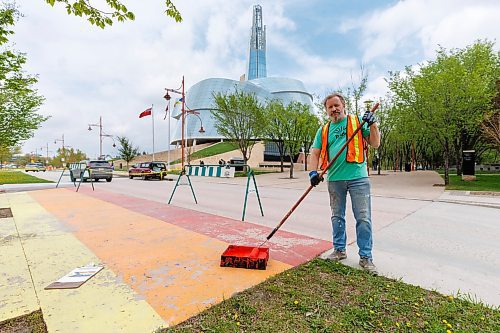 MIKE DEAL / FREE PRESS
James Culleton paints the rainbow flag onto the sidewalk at The Forks, something he has been doing for many years.
James Culleton has been making art in public for close to 30 years in Winnipeg, but his latest work has gotten the multi-disciplinary artist newfound attention. During the ongoing trial of Jeremy Skibicki, Culleton has served as courtroom artist, bringing his own sketch style to one of the most high profile criminal proceedings in modern Manitoban history.
See Ben Waldman story
240516 - Thursday, May 16, 2024.