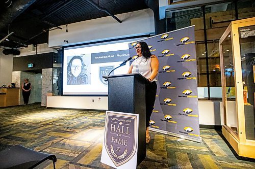MIKAELA MACKENZIE / FREE PRESS

New Football Hall of Fame inductee Andrea Backlund says a few words of thanks at the Sport Manitoba building in on Thursday, May 16, 2024. 

For Josh story.

