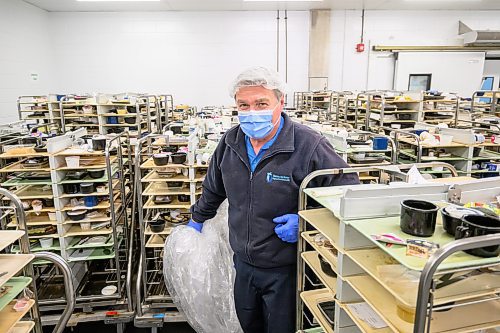 Mike Sudoma/Free Press
Don (no last name given) a worker with WRHA&#x2019;s Food and Nutrition services drops off a cart full of dirty food trays delivered back from hospitals all over Winnipeg
May 15, 2024