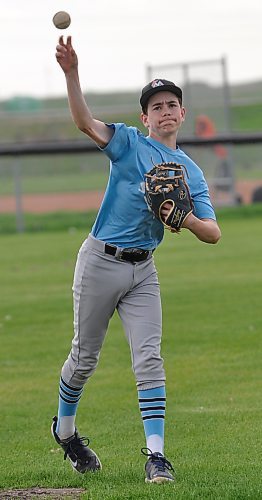 Catcher Carter McCannell, who had a grand slam in his team's opening season doubleheader, warms his arm up before Thursday night practice at Simplot Millenium Park. (Jules Xavier/The Brandon Sun)