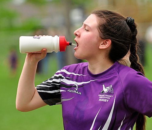 At halftime, Vincent Massey Vikings wing Maria Matthies hydrates after helping her team take a 17-5 lead over the host Crocus Plainsmen, a team featuring her older sibling Allie, who also plays wing. (Jules Xavier/The Brandon Sun)