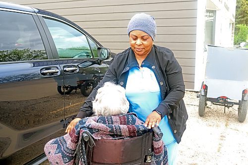 Helen Onuke takes one of her clients to Harmony Medical Clinic on Friday. (Abiola Odutola/The Brandon Sun)