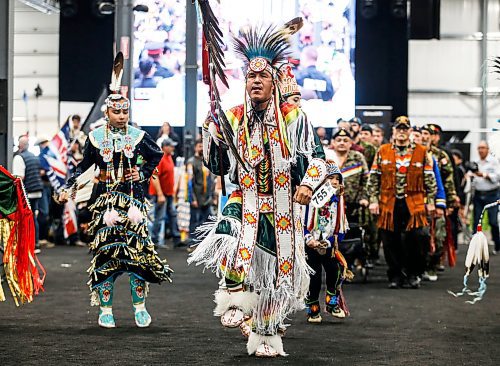 JOHN WOODS / FREE PRESS
Dancers perform during the grand entrance at Manito Abhee powwow Sunday, May 19, 2024. 

Reporter: standup