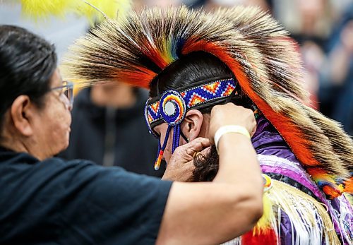 JOHN WOODS / FREE PRESS
Dancers prepare for the grand entrance at Manito Abhee powwow Sunday, May 19, 2024. 

Reporter: standup