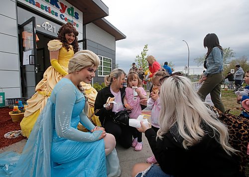 JOHN WOODS / FREE PRESS
Princesses Elsa and Belle talk to Lori Podaima, from left, with her granddaughters Scarlett and Autumn, and her daughter Dare Podiama at the Gymkyds Gymnastics Centre fundraiser for the Children&#x2019;s Hospital Foundation of Manitoba Monday, May 20, 2024. Gymkids is hoping to raise more than $10000.

Reporter: standup