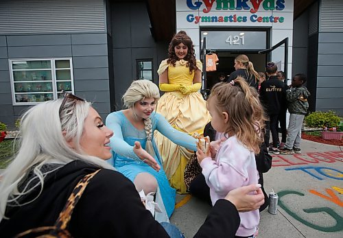 JOHN WOODS / FREE PRESS
Princesses Elsa and Belle talk to Dare Podiama and daughter Autumn at the Gymkyds Gymnastics Centre fundraiser for the Children&#x2019;s Hospital Foundation of Manitoba Monday, May 20, 2024. Gymkids is hoping to raise more than $10000.

Reporter: standup