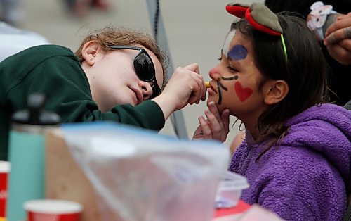 JOHN WOODS / FREE PRESS
Delaney does some face painting for children at the Gymkyds Gymnastics Centre fundraiser for the Children&#x2019;s Hospital Foundation of Manitoba Monday, May 20, 2024. Gymkids is hoping to raise more than $10000.

Reporter: standup