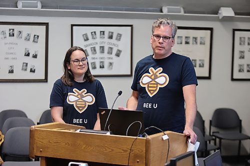 Deanna Smid and Grant Hamilton provide an update on the "Bee U" urban beekeeping program at Brandon University to Brandon City Council on Tuesday. Hamilton said they're aiming to produce more than 1,000 pounds of honey this year. (Colin Slark/The Brandon Sun)