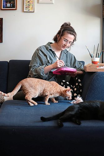 Ruth Bonneville / Free Press

49.8 - Creators - pet portraits

Journalist portraits of local artist,  Annick Svistovski, working from home on painting portraits of pets from a photo her clients have provided for her.  Her house cats love to hang around while she works.  

Names of cats in this photo: Hawkins (orange) and Pea (black).


Story: 49.8 The Creators: Pet Portrait Artist

Annick is a painter who specializes in painting animal portraits from pictures which her clients send her. She&#x573; currently painted cats and dogs only but is hoping to be able to paint other pets.

 
Story by AV Kitching 


May 9th, 2024
