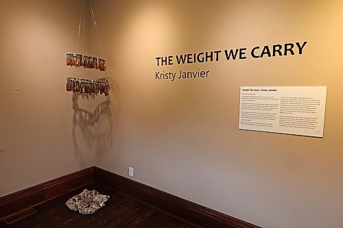 In the corner sits "healing dress" next to the exhibition sign. The exhibition ran from May 3-May 31, 2024 at the Killarney Heritage Home for the Arts. (Charlotte McConkey/The Brandon Sun)