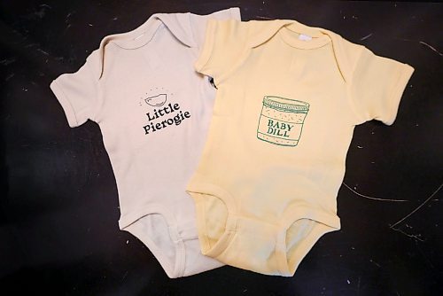 Ruth Bonneville / Free Press
Cole Wielgosz’s wares now include onesies for infants.